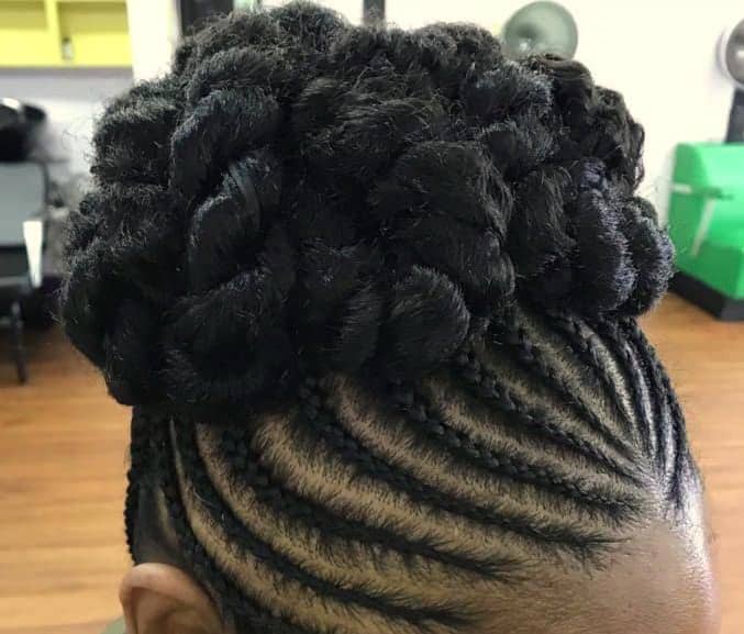 Mini Cornrows with a Lush Bun. Photo: @unconditionedroots Source: Instagram